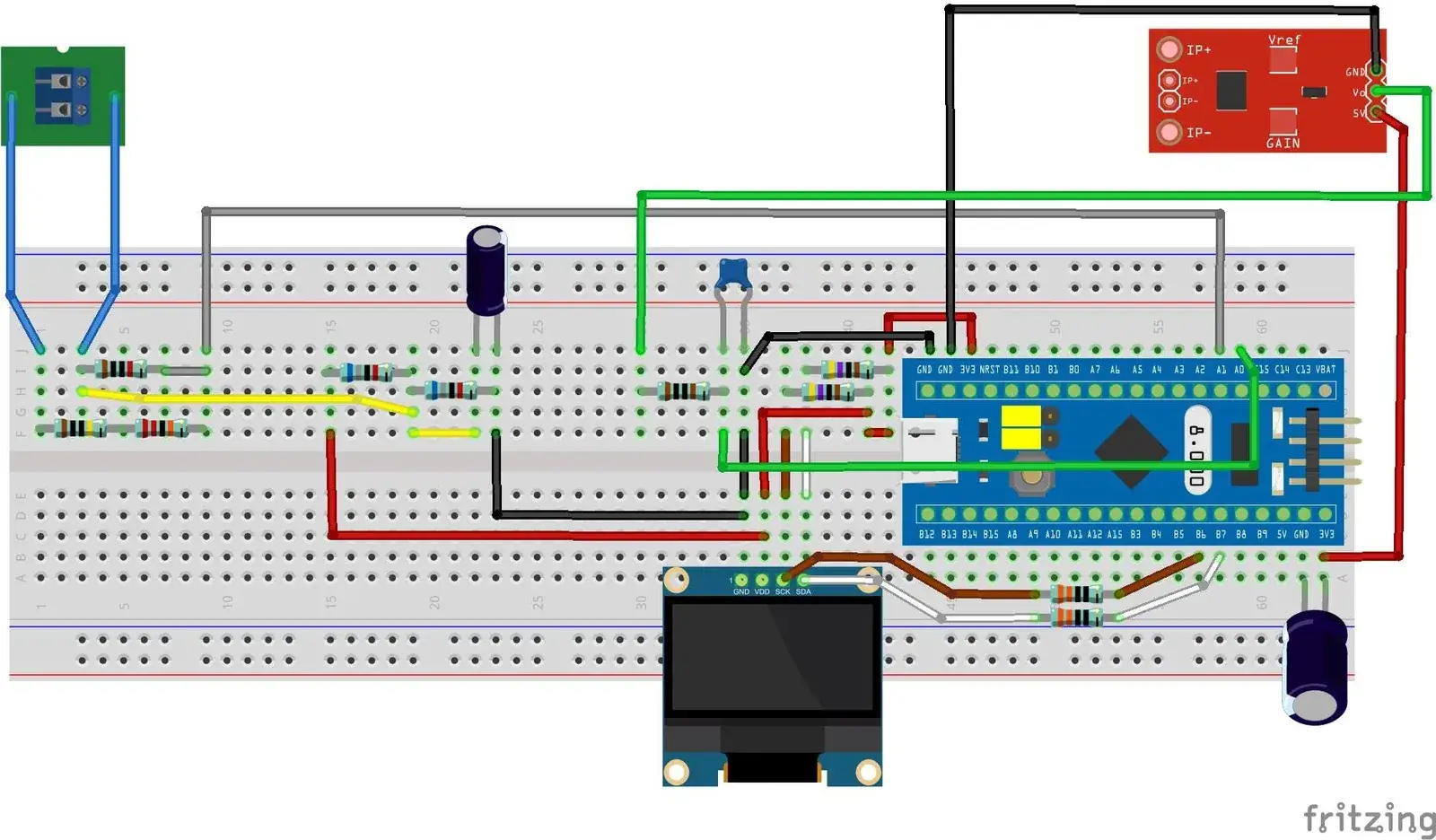 Diagrama de conexiones en protoboard: placa STM32F103, módulo de sensor de corriente de efecto Hall, divisor resistivo de tensión, condensadores electrolíticos y pantalla OLED conectada por I²C