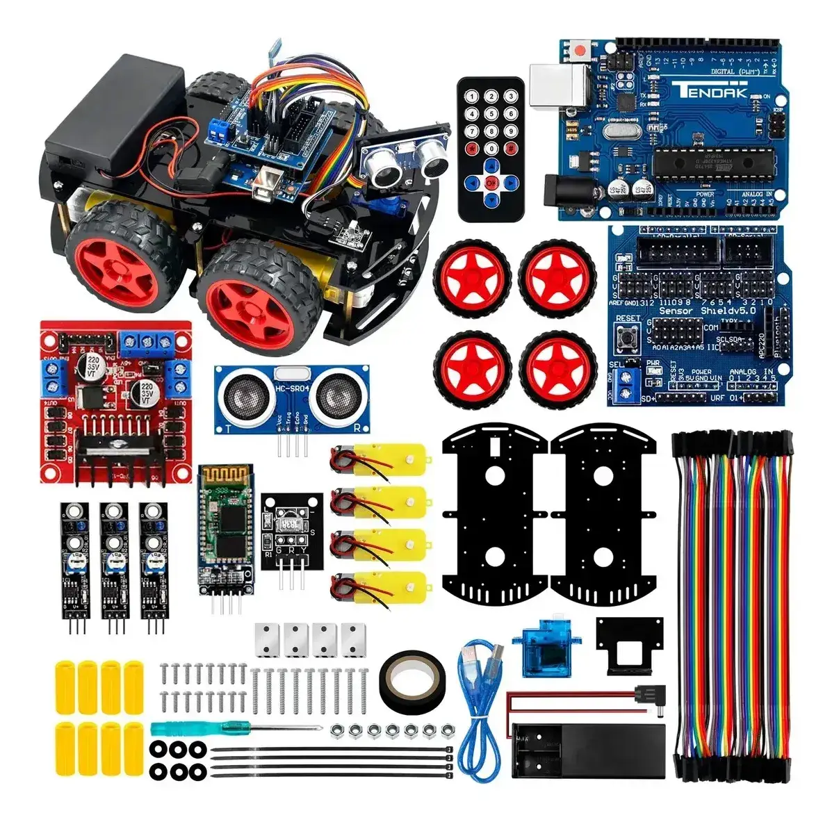 Todas las piezas del kit de robótica extendidas sobre fondo blanco, con el coche 4WD armado arriba a la izquierda